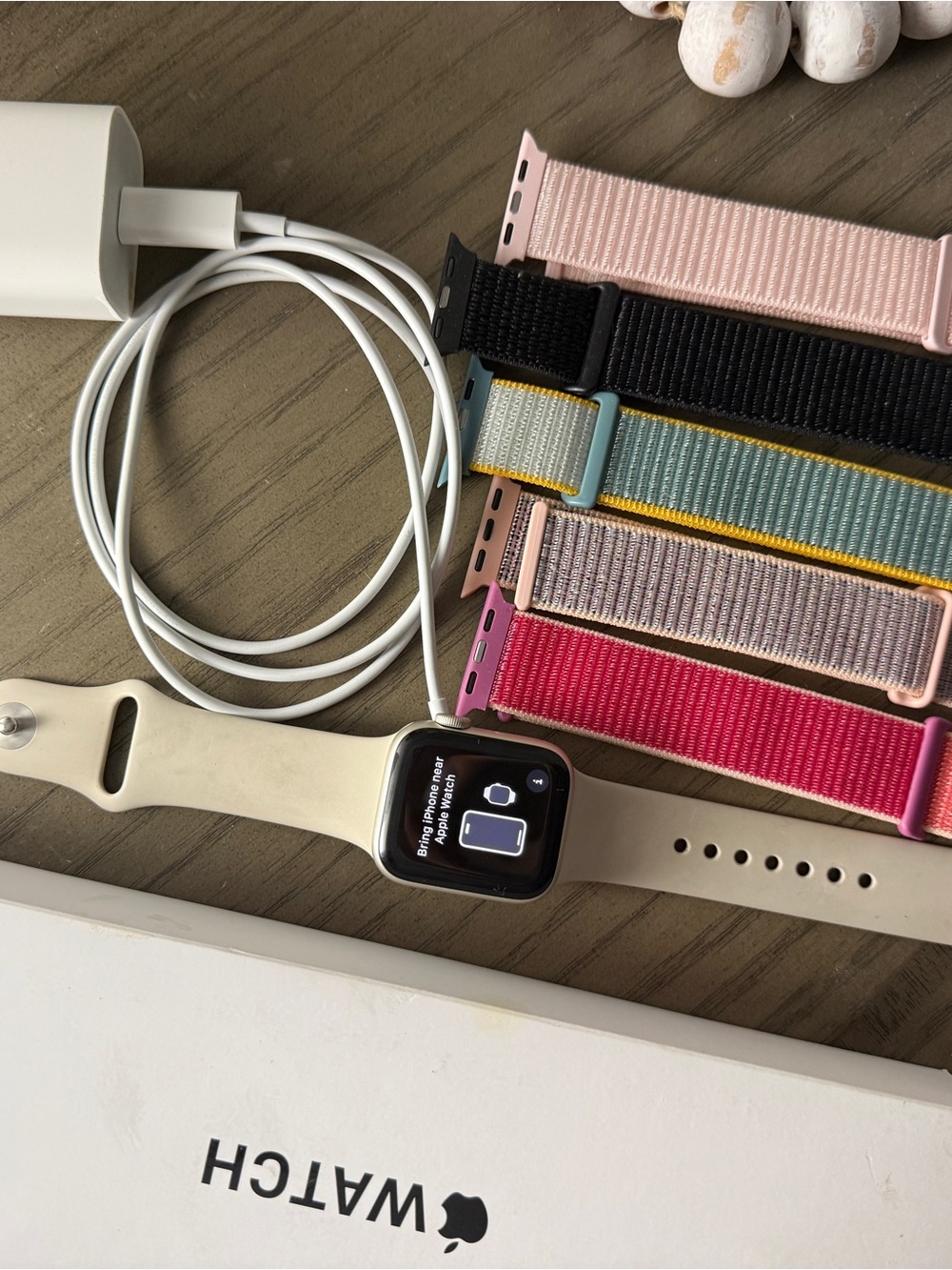 Apple Watch SE 2nd gen with White Sport Band and Multi-Color Nylon Straps